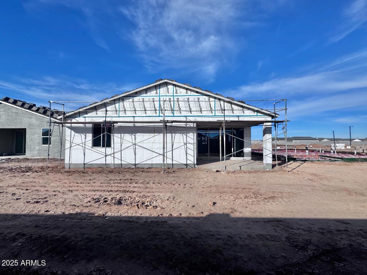 15715 West Camden Avenue Waddell, AZ 85355 - Photo 8 of 20 a front view of a house with a yard