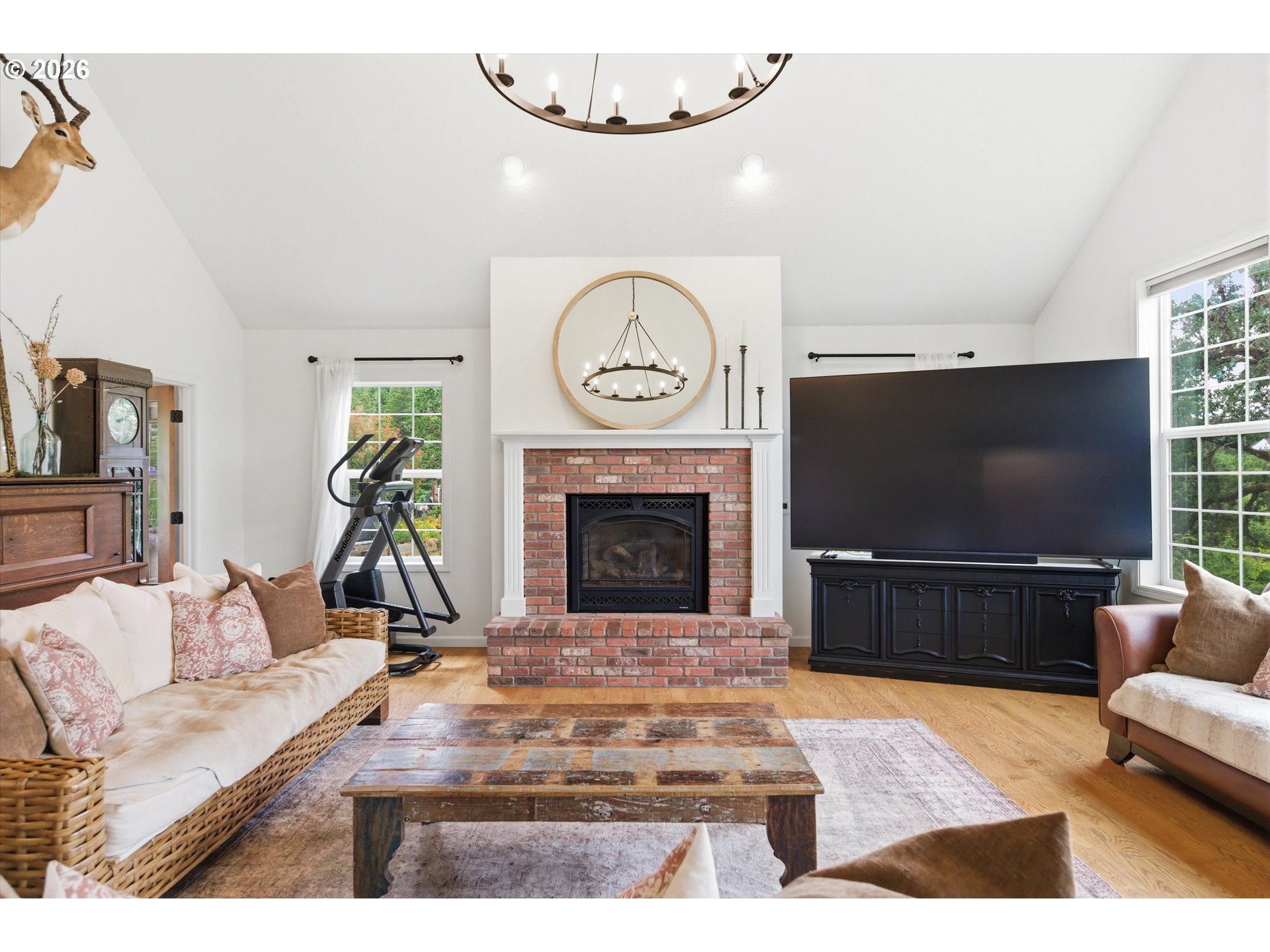 13880 McCaleb Road Monmouth, OR 97361 - Photo 21 of 44 a living room with furniture a rug and a fireplace