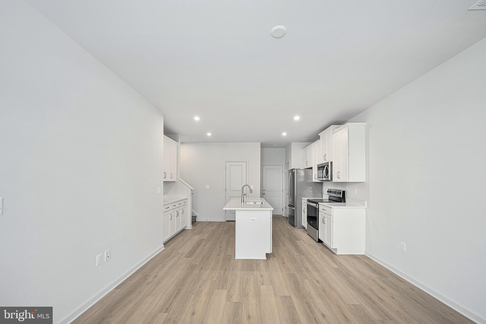 2540 Neabsco Common Place Woodbridge, VA 22191 - Photo 11 of 33 a view of kitchen with wooden floor