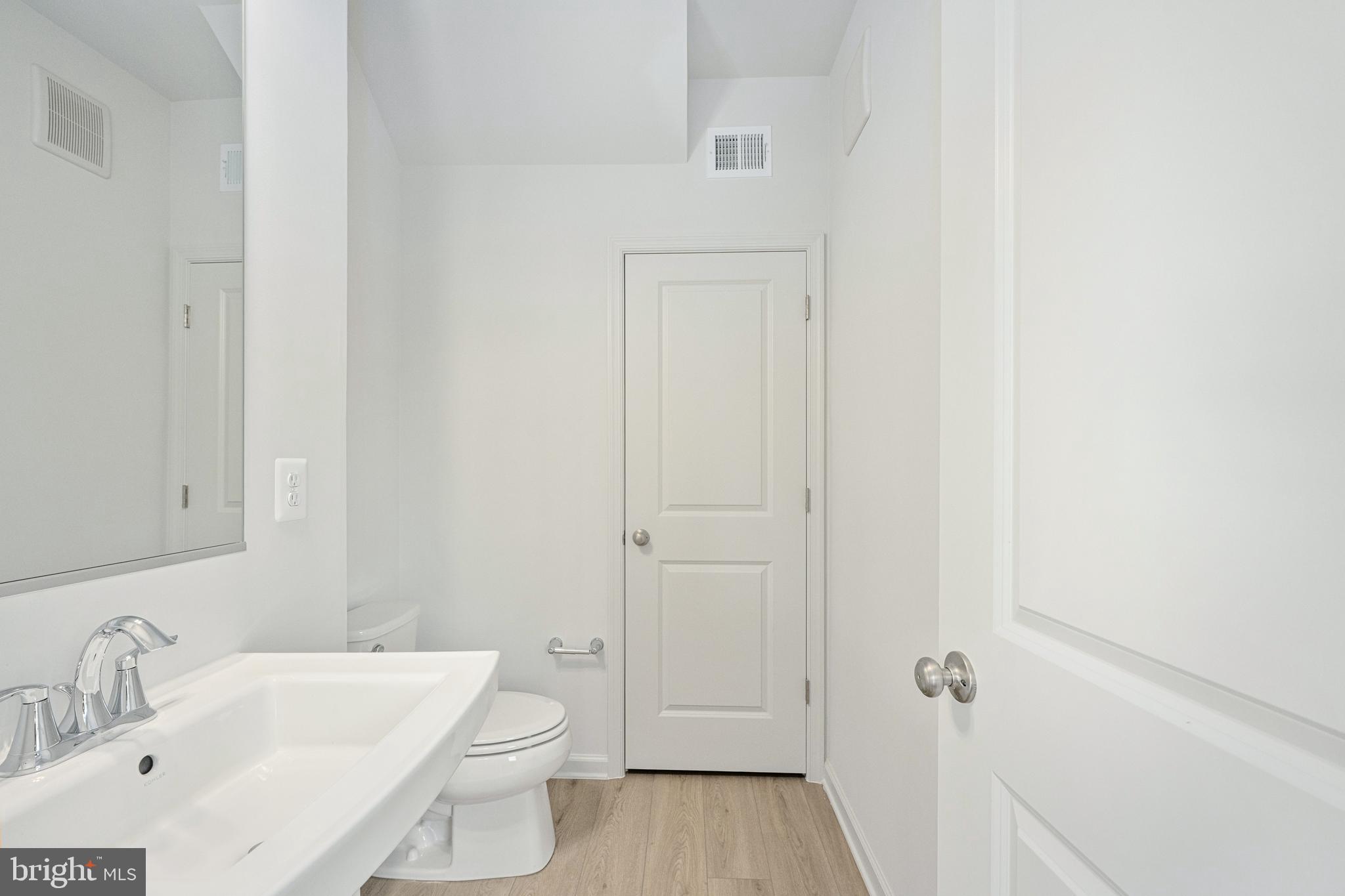 2540 Neabsco Common Place Woodbridge, VA 22191 - Photo 17 of 33 a bathroom with a sink a toilet and shower