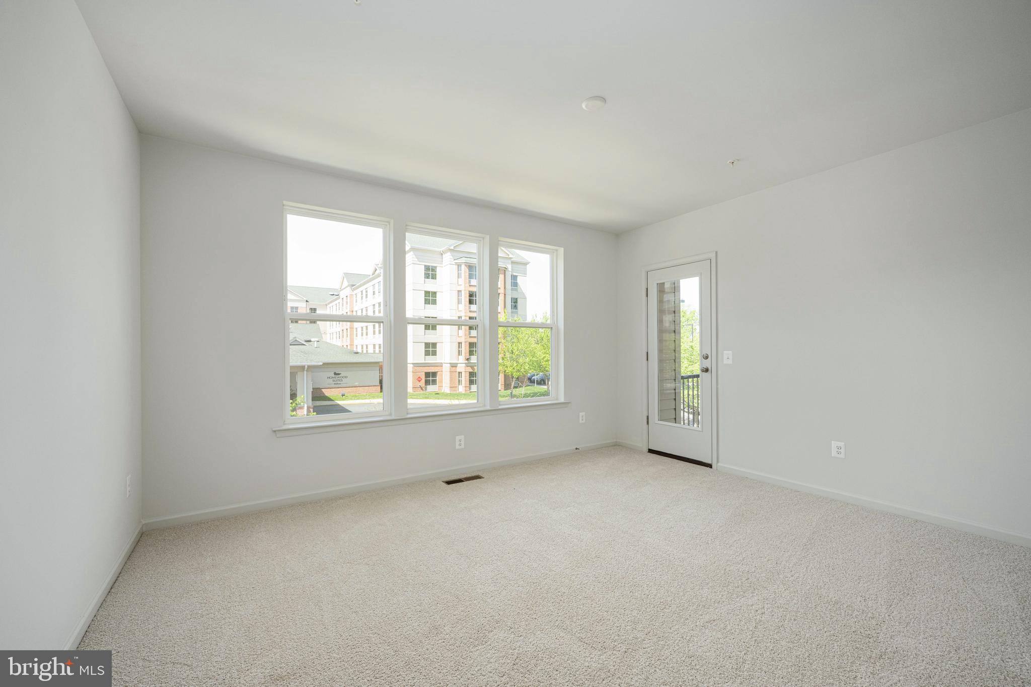 2540 Neabsco Common Place Woodbridge, VA 22191 - Photo 25 of 33 an empty room with windows