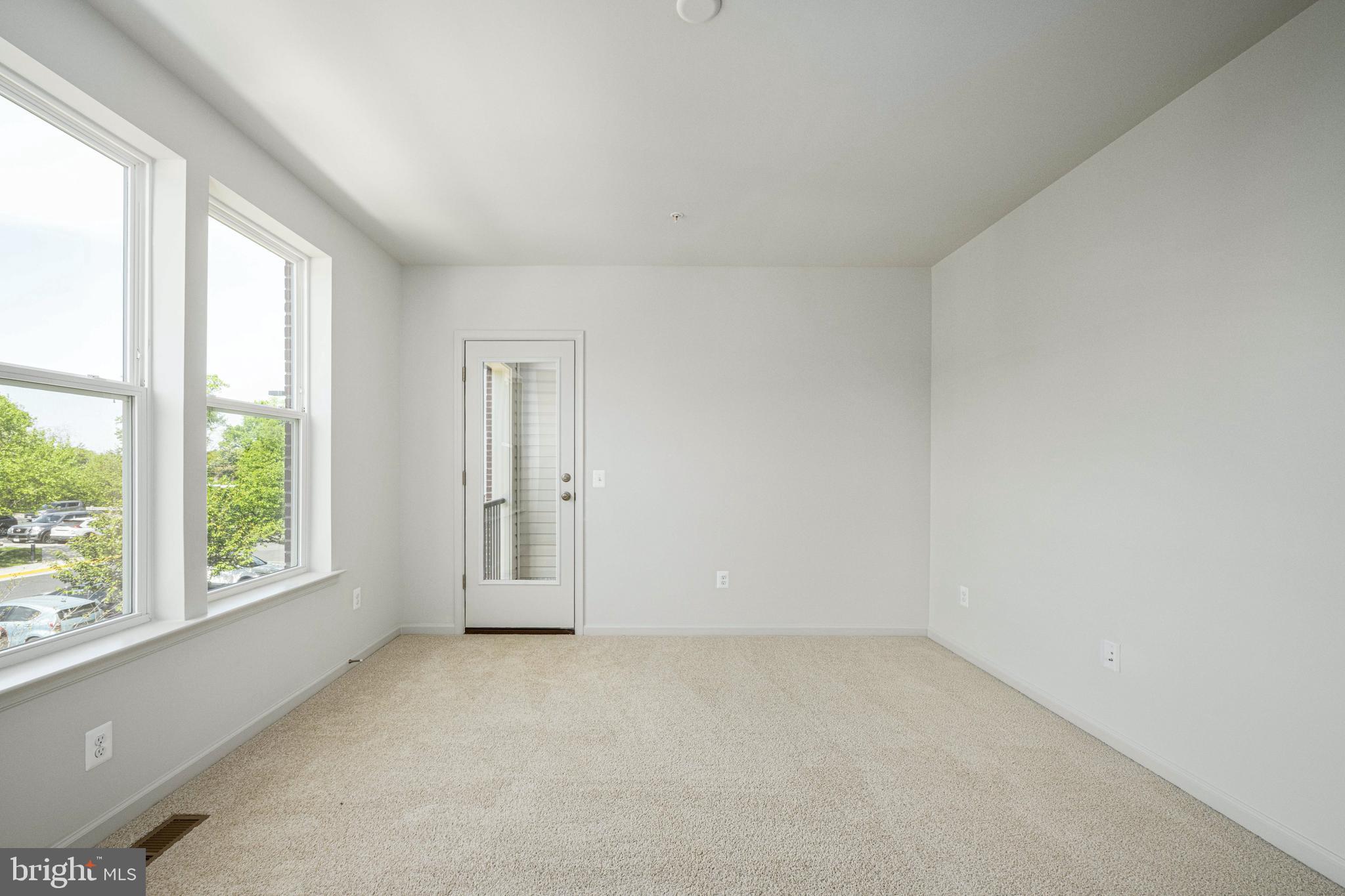 2540 Neabsco Common Place Woodbridge, VA 22191 - Photo 26 of 33 an empty room with windows