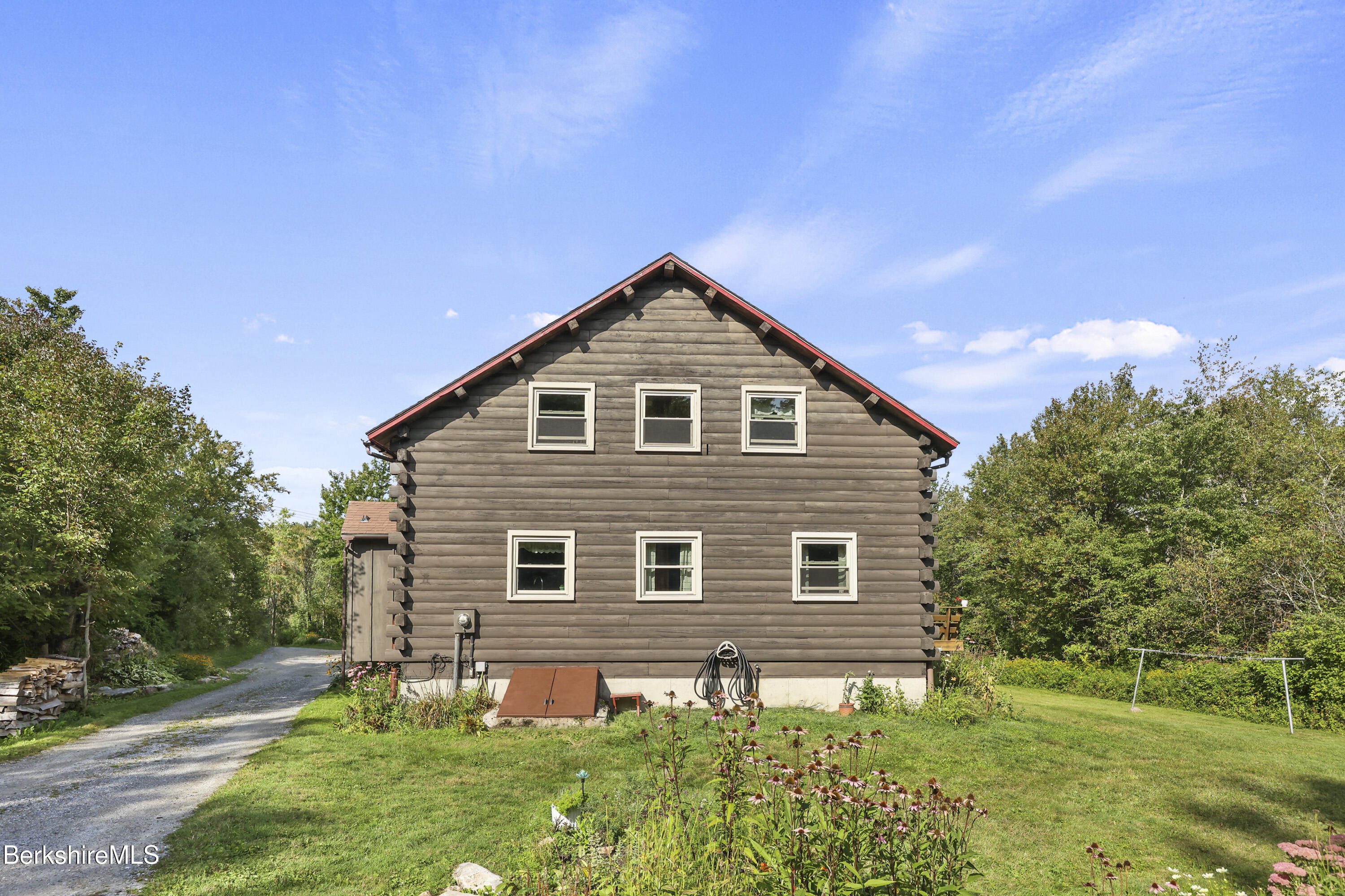 78 East Main Road Peru, MA 01235 - Photo 44 of 56 a front view of a house with garden