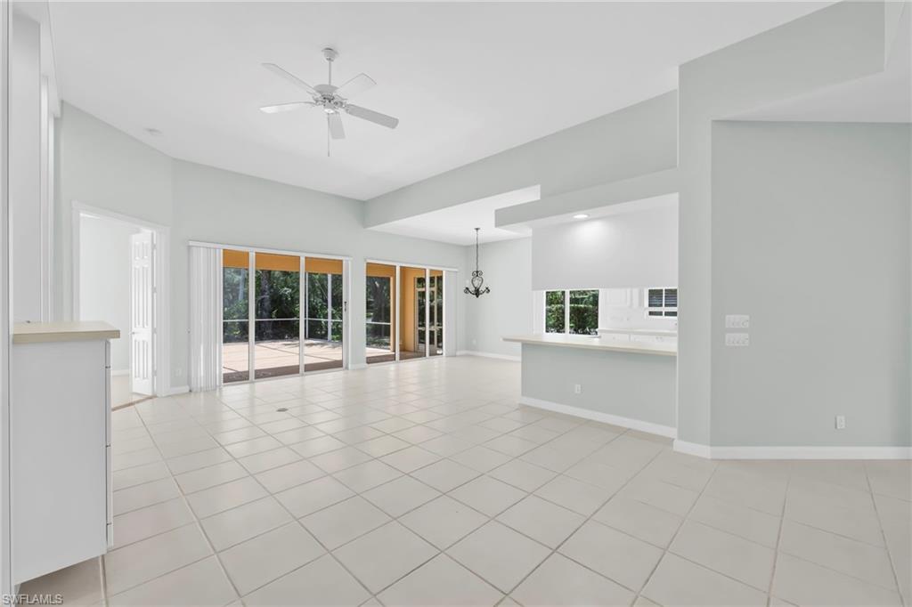 3000 Ellice Way Naples, FL 34119 - Photo 14 of 49 Open Living/Dining/Great Room with tiles throughout the whole house