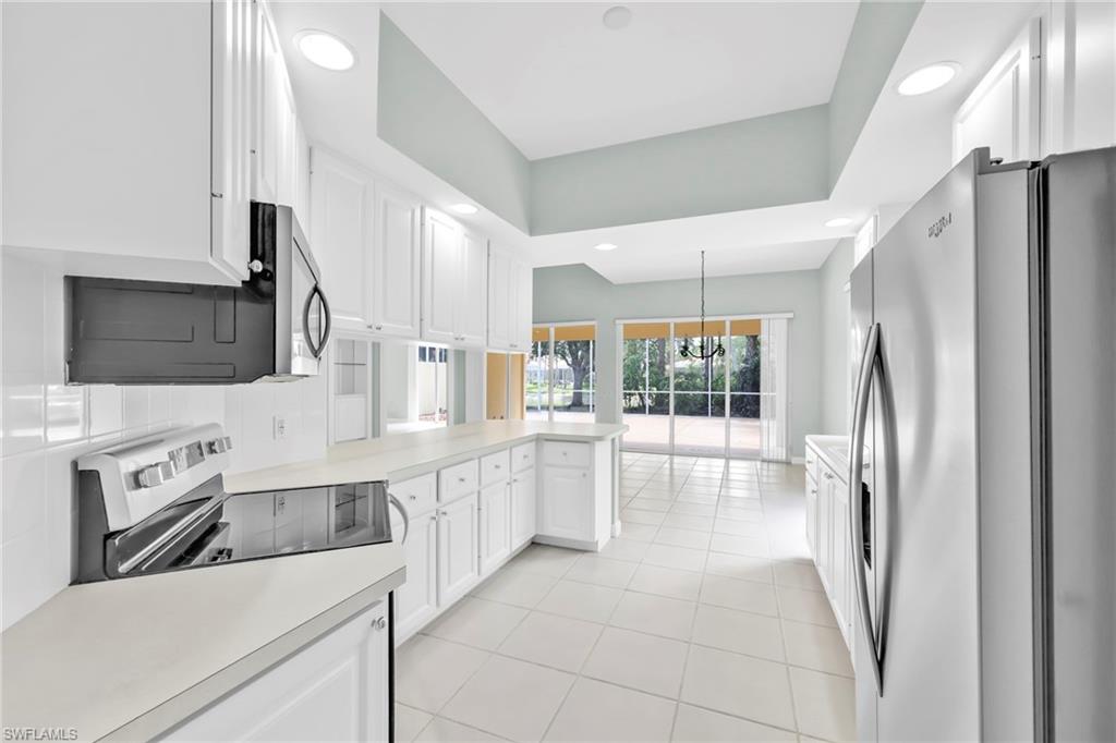 3000 Ellice Way Naples, FL 34119 - Photo 20 of 49 Open Ktichen with stainless steel applicances.