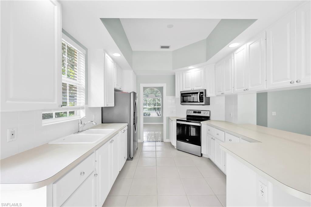 3000 Ellice Way Naples, FL 34119 - Photo 24 of 49 Open Kitchen with access to Den/Office