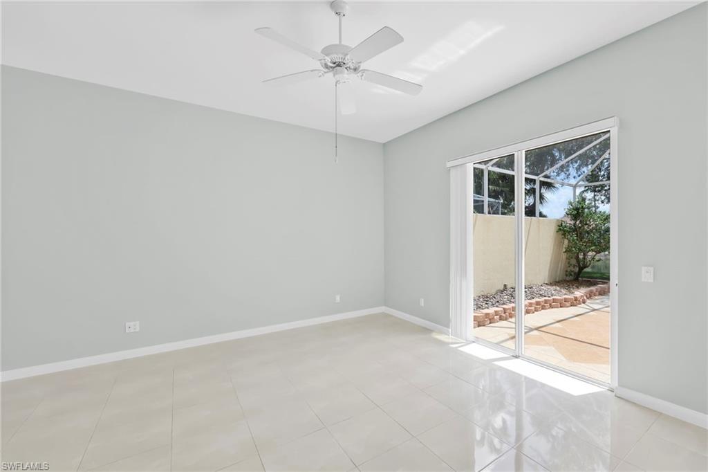 3000 Ellice Way Naples, FL 34119 - Photo 25 of 49 Master Bedroom with tiles and direct access to the Lanai