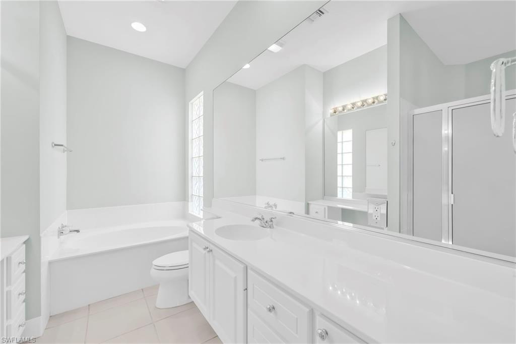 3000 Ellice Way Naples, FL 34119 - Photo 28 of 49 Primary Bathroom with bathtub,