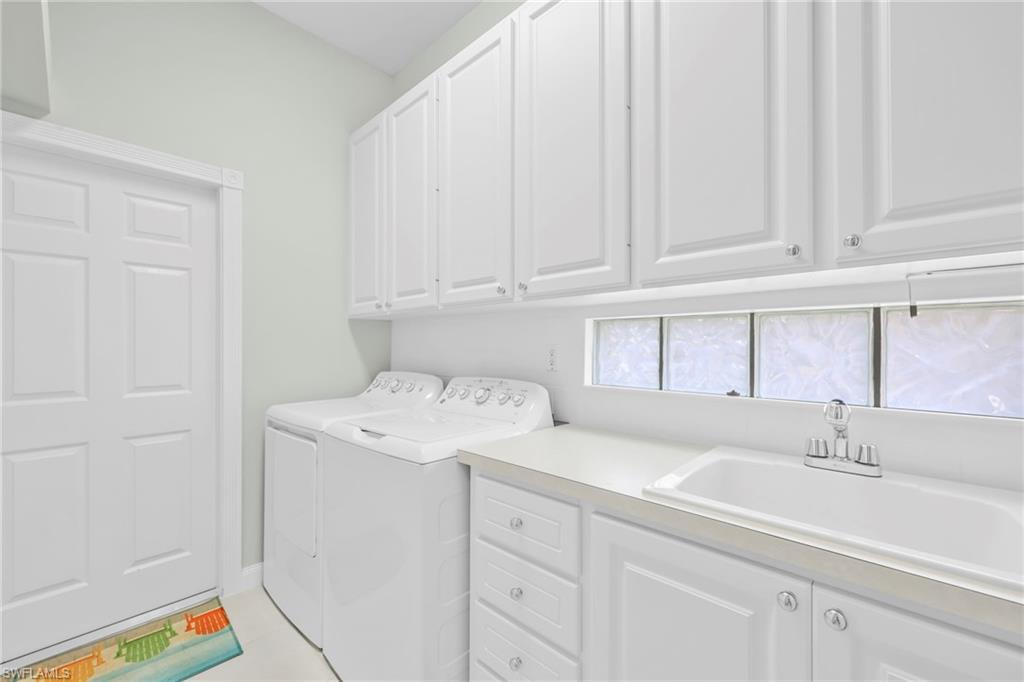 3000 Ellice Way Naples, FL 34119 - Photo 40 of 49 Laundry room with sink