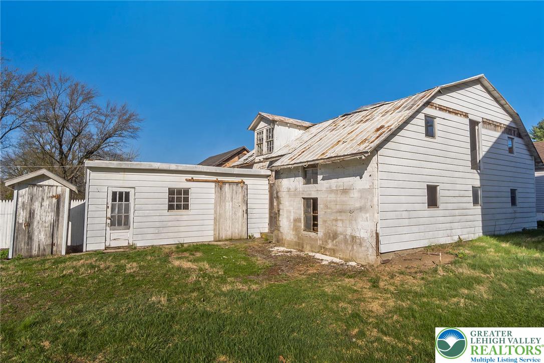 2213 Village Road Orefield, PA 18069 - Photo 30 of 41 a view of a house with a yard