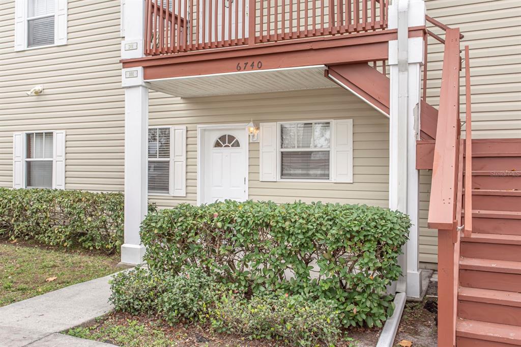 6740 Moonglow Drive, Unit 101 Port Richey, FL 34668 - Photo 3 of 39 front view of a house