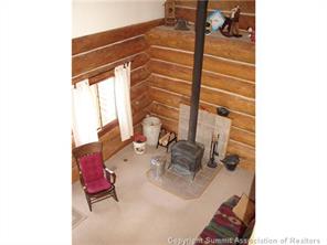199 Sheep Ridge Road Fairplay, CO 80440 - Photo 6 of 16 a balcony with table and chairs