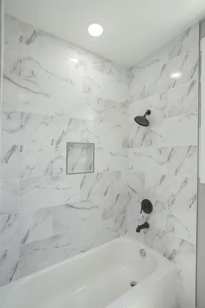 a bathroom with a bathtub