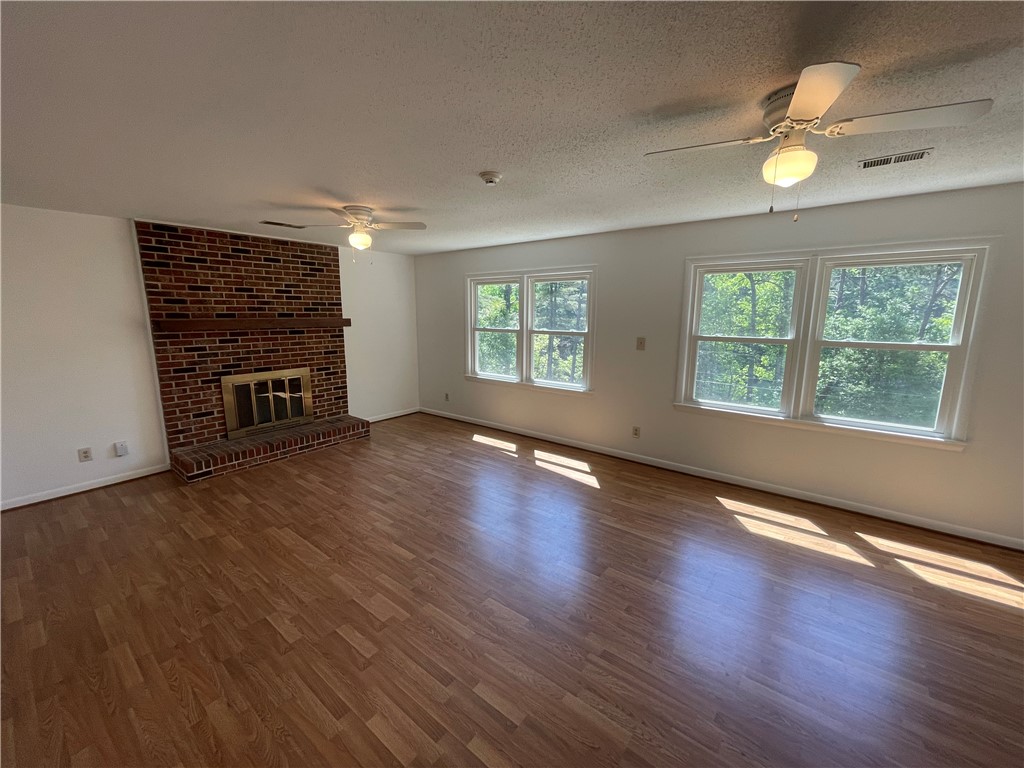 485 Mountain Rest Lake Road Mountain Rest, SC 29664 - Photo 16 of 45 Upper level (five steps) primary bedroom suite with views of the lake and wood burning fireplace!