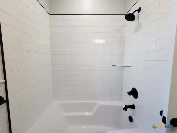 a bathroom with a bathtub