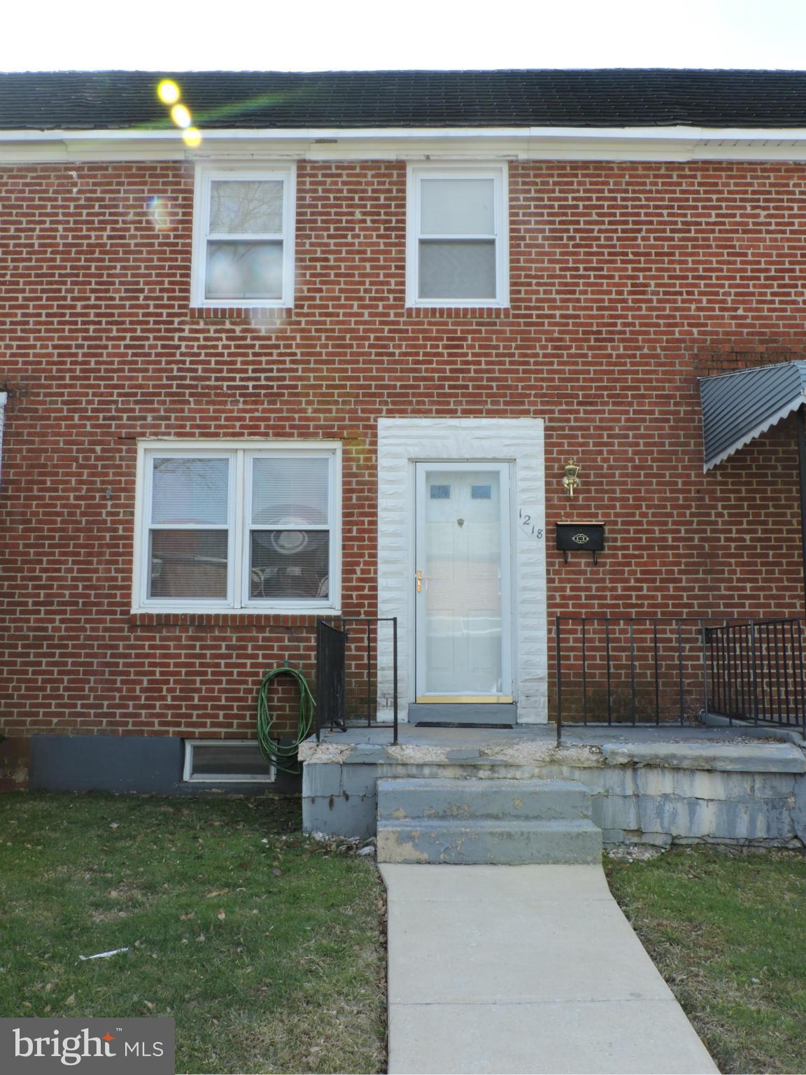 1218 Kevin Road Baltimore, MD 21229 - Photo 1 of 27 a house view with a outdoor space