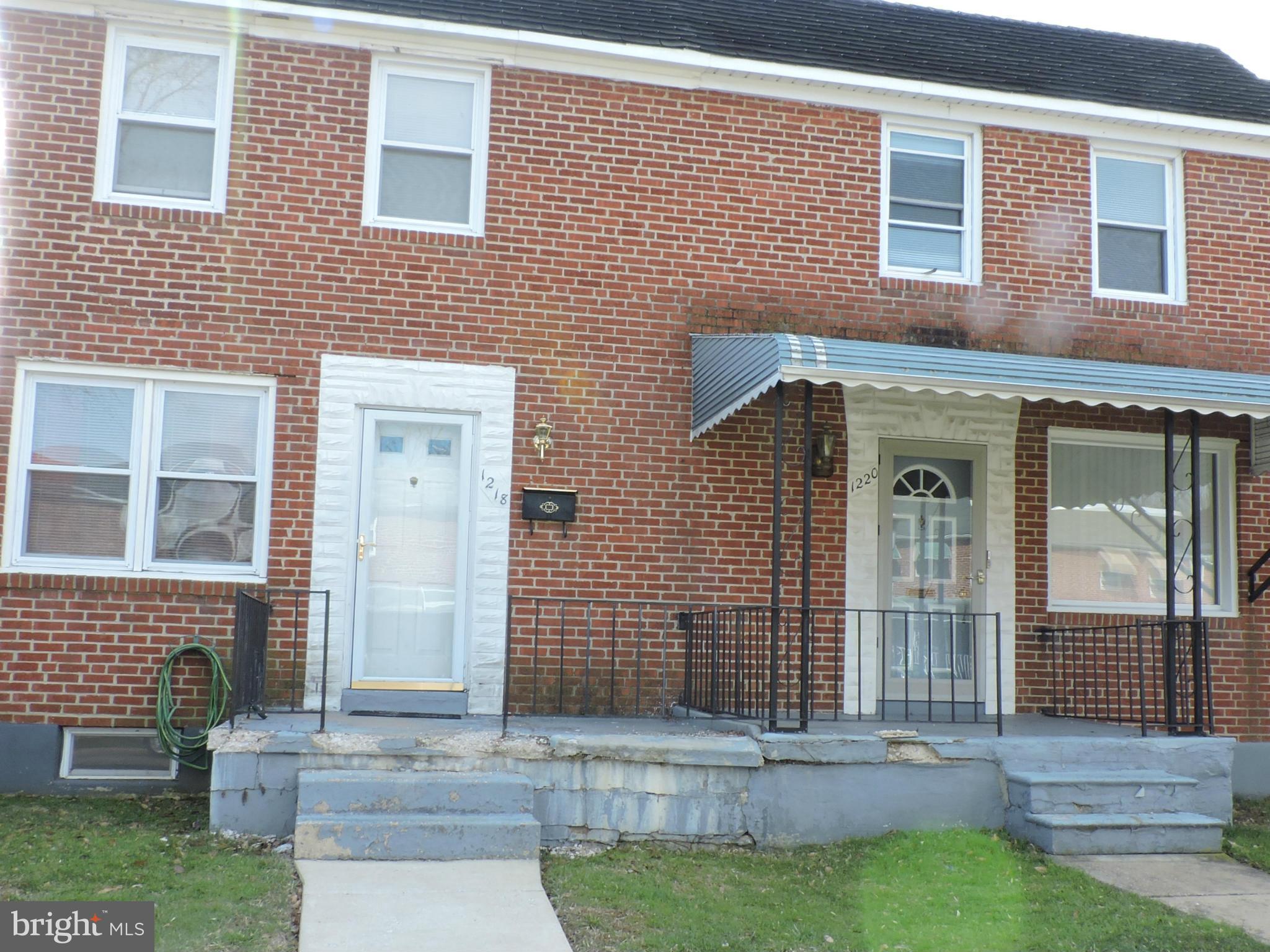 1218 Kevin Road Baltimore, MD 21229 - Photo 3 of 27 a front view of a house with garden