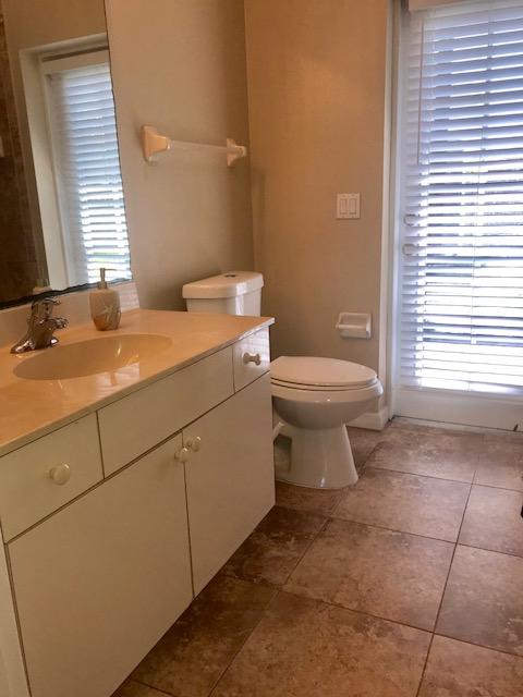 565 Southwest Homeland Road Port St. Lucie, FL 34953 - Photo 11 of 13 guest bath