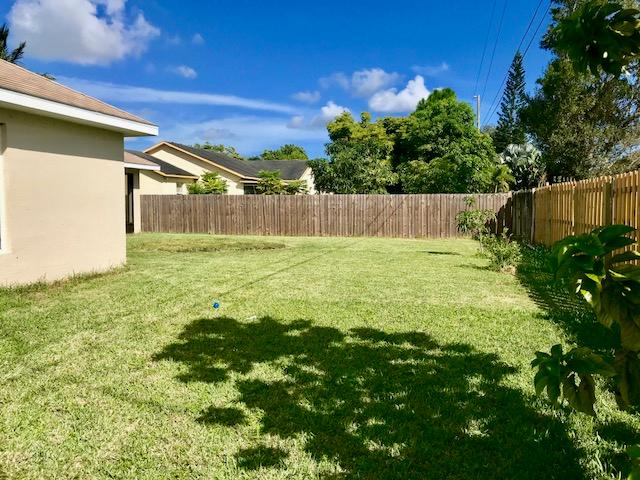 565 Southwest Homeland Road Port St. Lucie, FL 34953 - Photo 13 of 13 backyard2