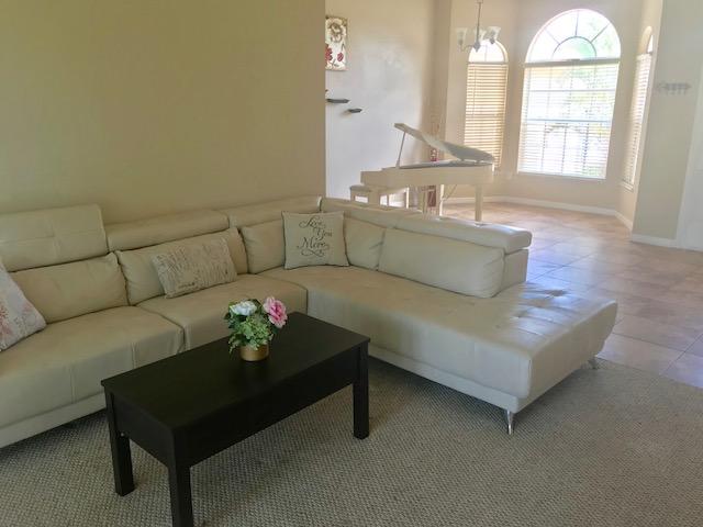565 Southwest Homeland Road Port St. Lucie, FL 34953 - Photo 2 of 13 family room