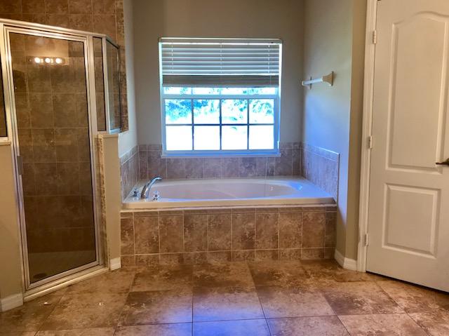 565 Southwest Homeland Road Port St. Lucie, FL 34953 - Photo 9 of 13 master bathroom2