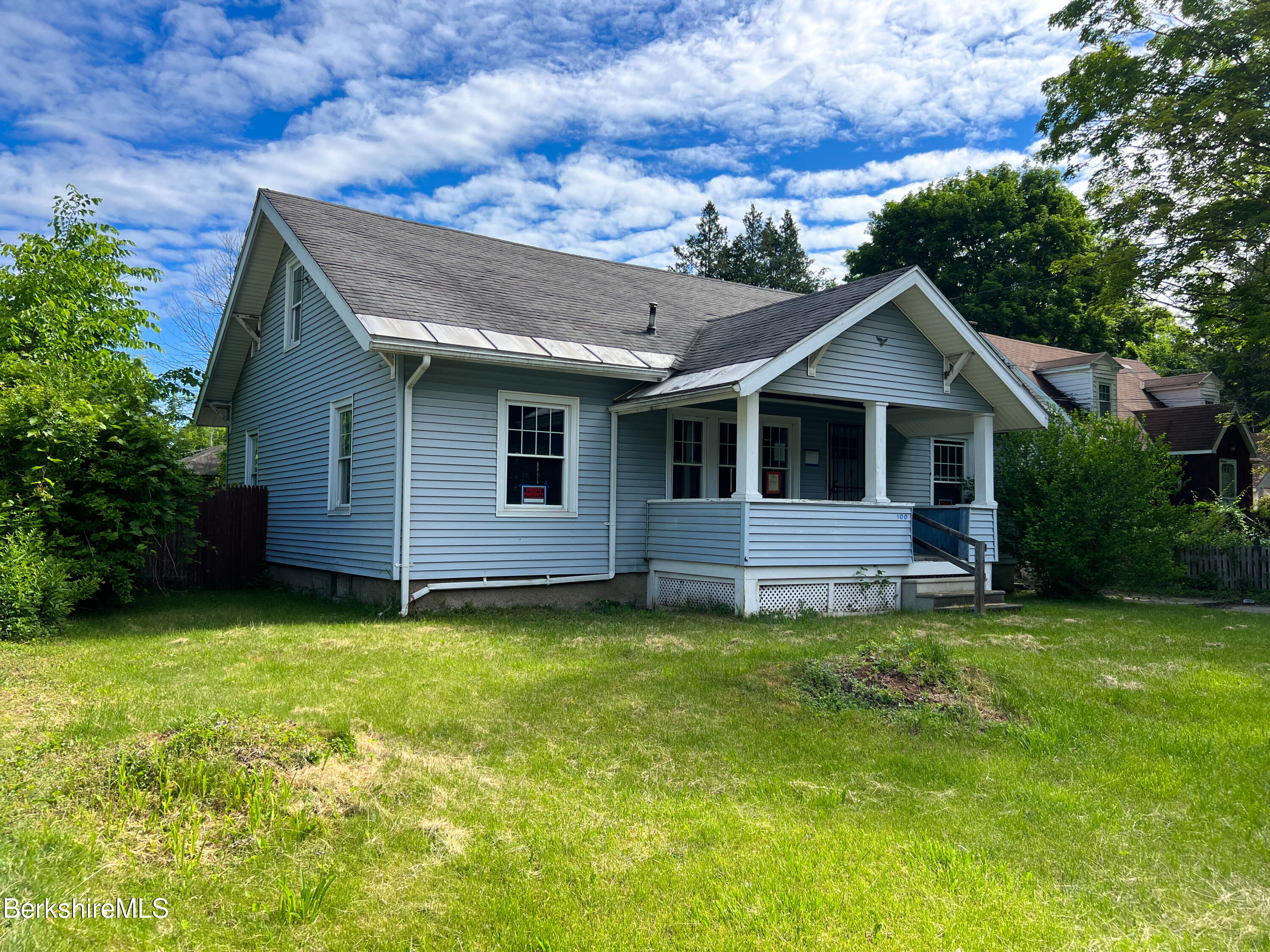 100 Boylston Street Pittsfield, MA 01201 - Photo 2 of 32 a house view with a garden space