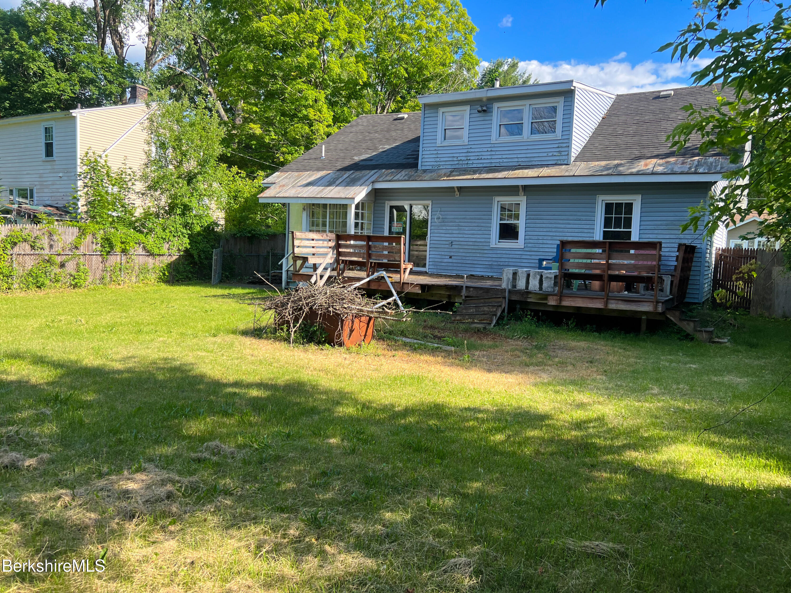 100 Boylston Street Pittsfield, MA 01201 - Photo 24 of 32 a view of a house with a yard patio and swimming pool