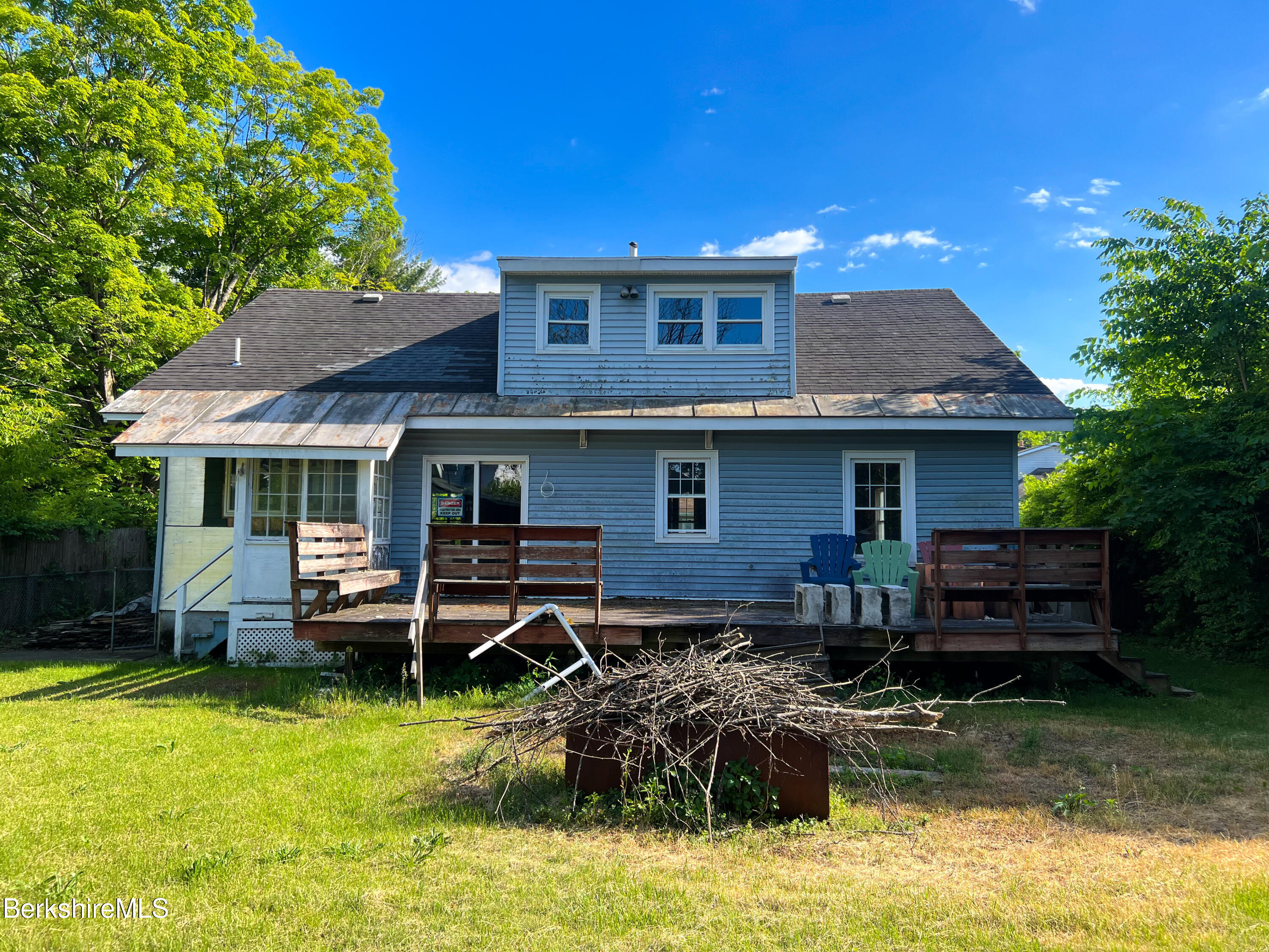 100 Boylston Street Pittsfield, MA 01201 - Photo 26 of 32 a front view of a house with a yard table and chairs