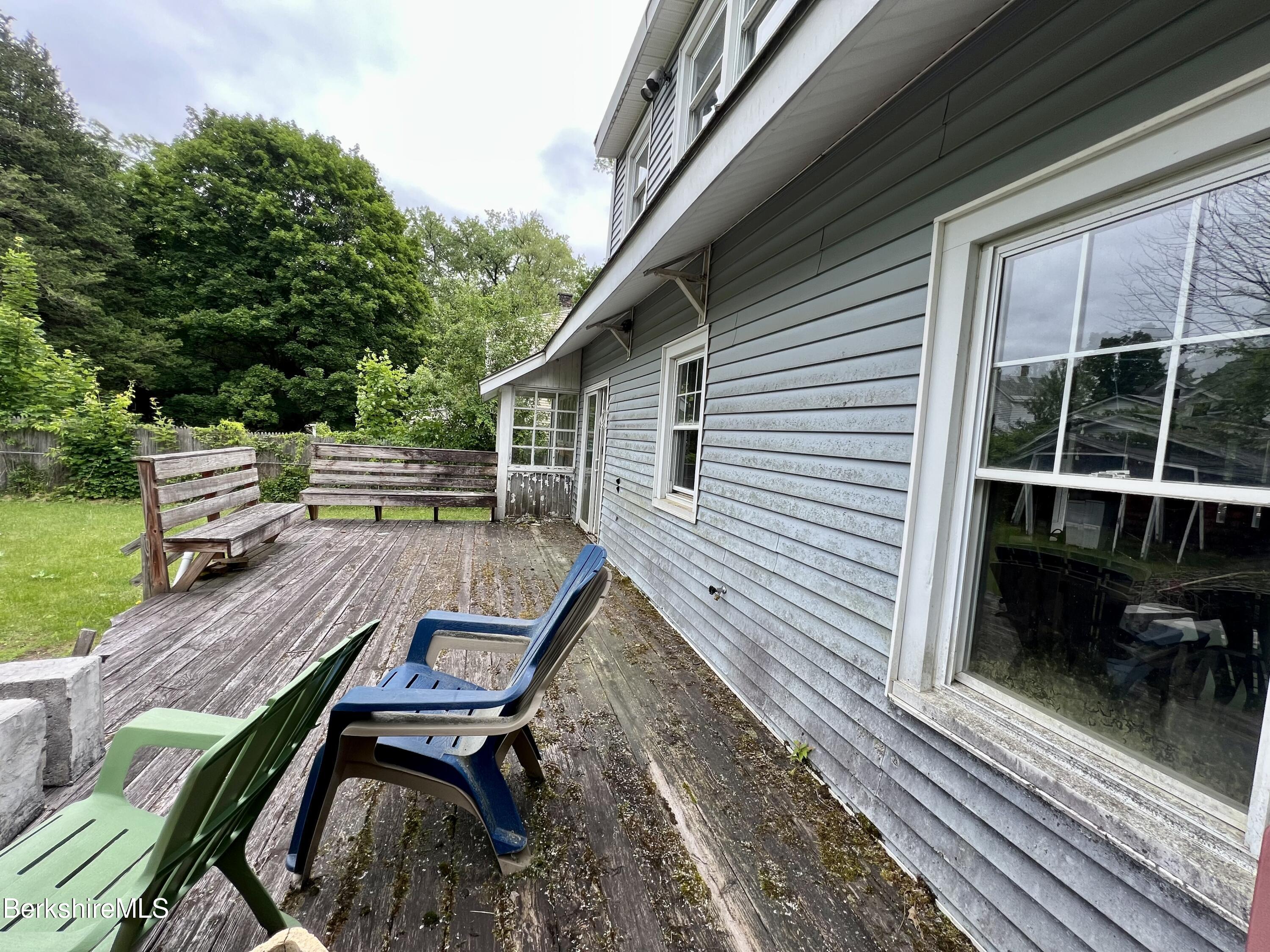 100 Boylston Street Pittsfield, MA 01201 - Photo 29 of 32 a view of deck with chairs and wooden floor