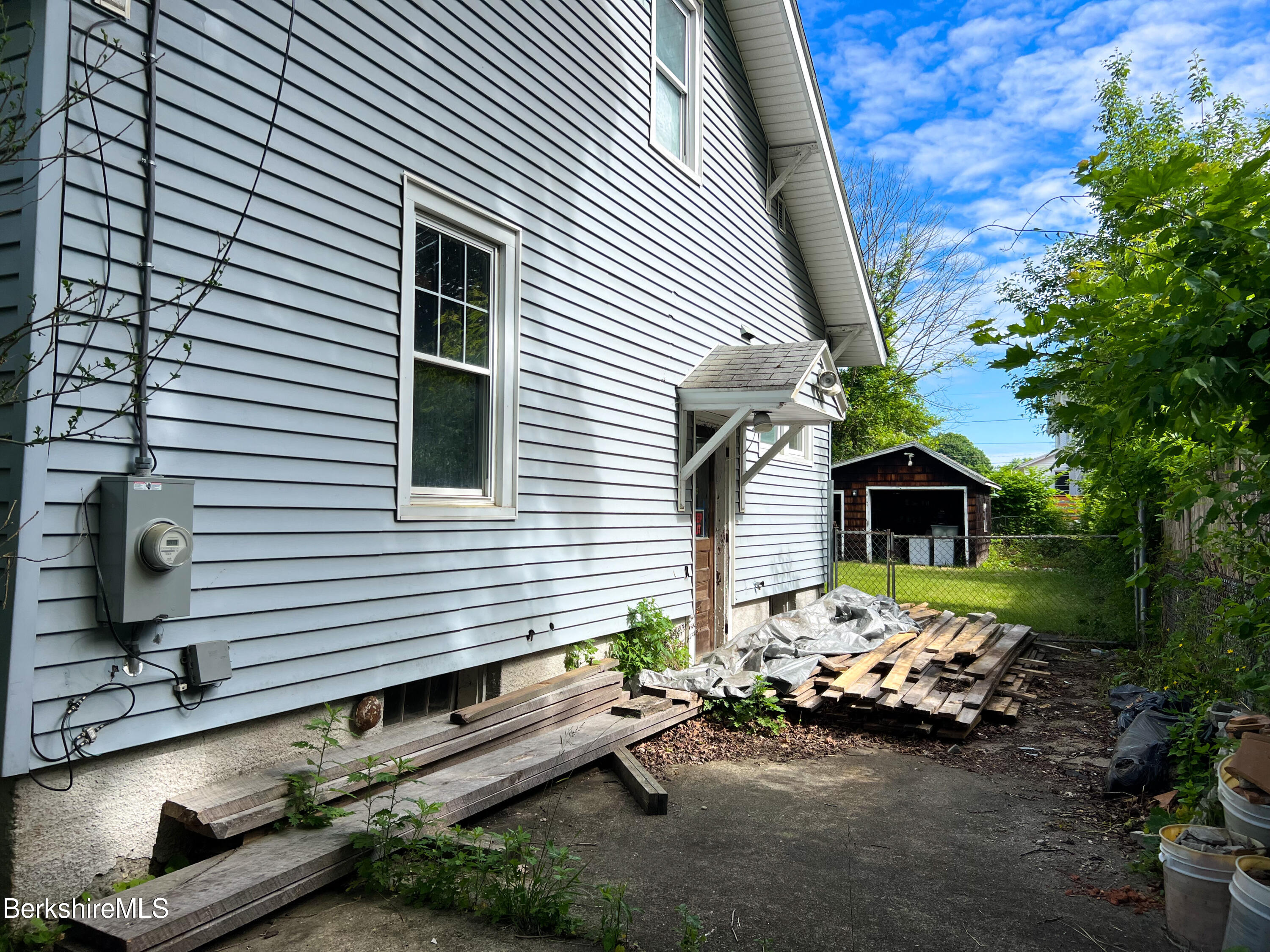 100 Boylston Street Pittsfield, MA 01201 - Photo 7 of 32 a front view of a house with yard