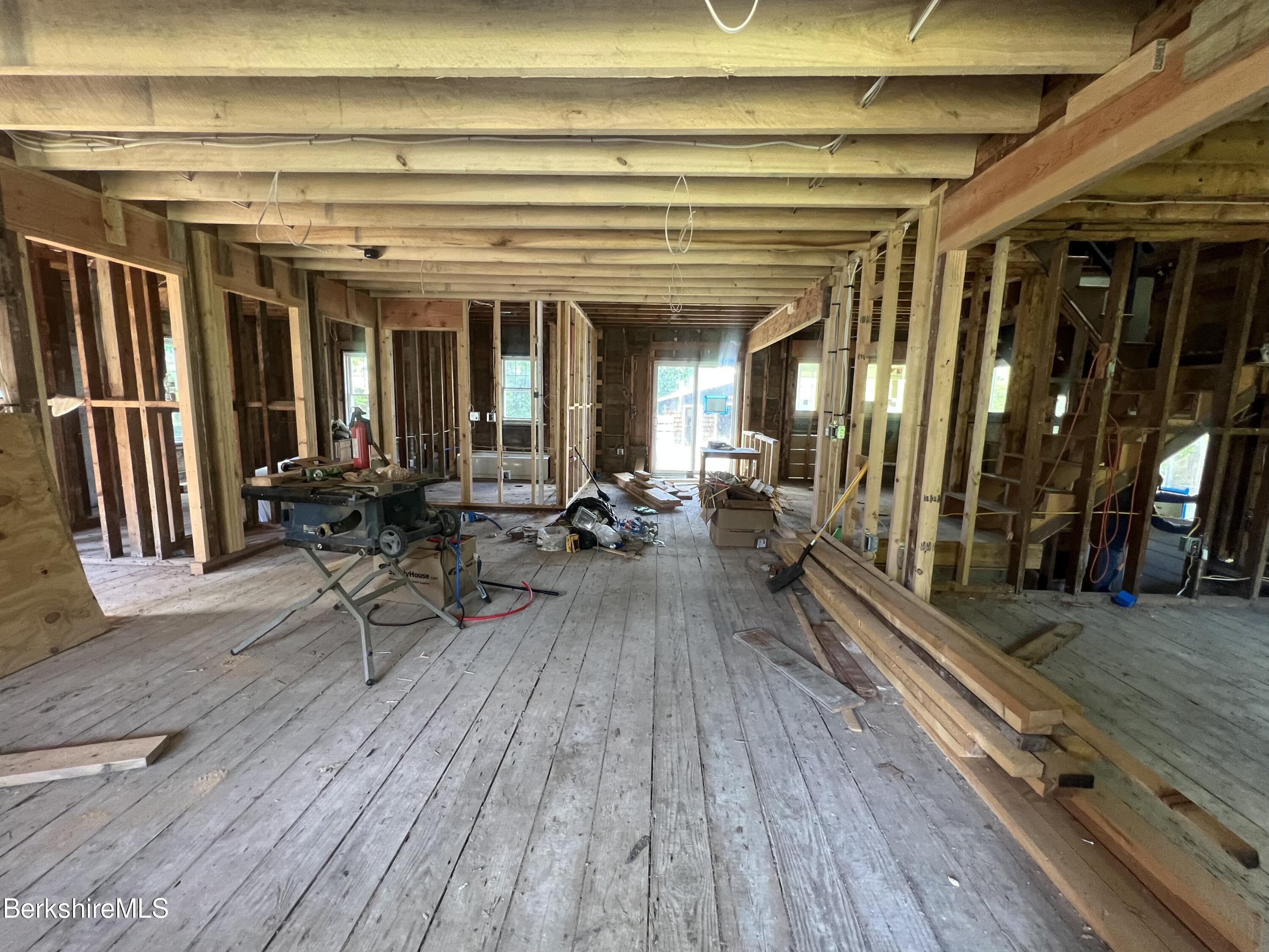 100 Boylston Street Pittsfield, MA 01201 - Photo 9 of 32 a view of a chairs and table on the wooden floor