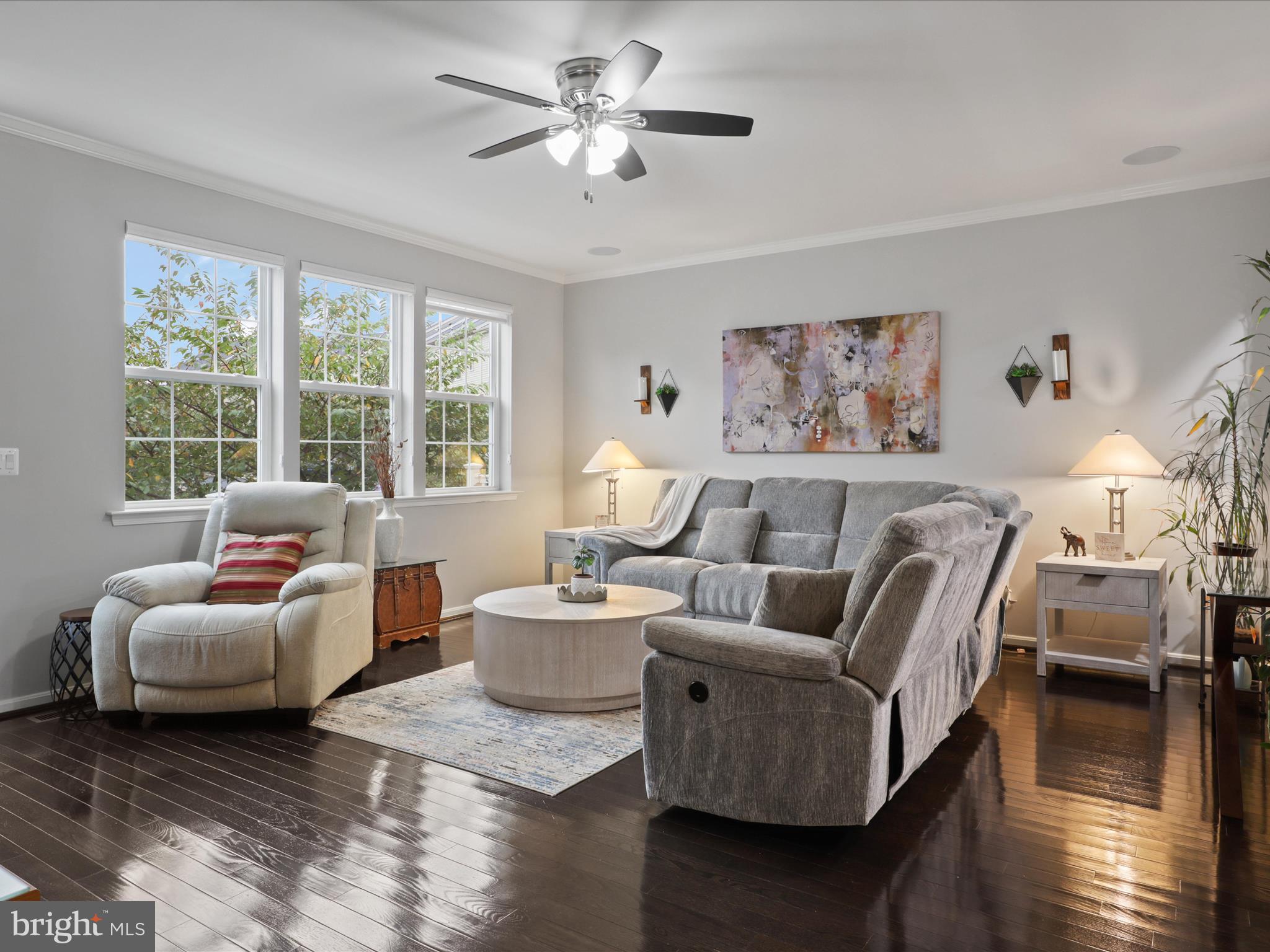16006 Madison Ridge Place Gainesville, VA 20155 - Photo 11 of 48 a living room with furniture and a large window