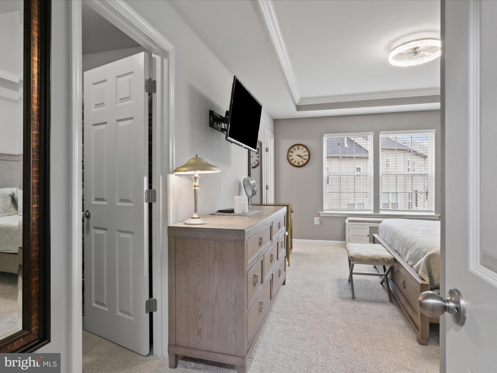 16006 Madison Ridge Place Gainesville, VA 20155 - Photo 24 of 48 a view of a livingroom with furniture flat screen tv and windows