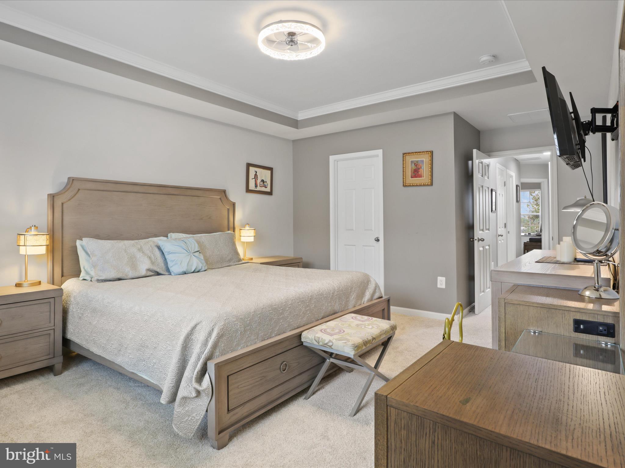 16006 Madison Ridge Place Gainesville, VA 20155 - Photo 26 of 48 a bedroom with a bed and a dresser