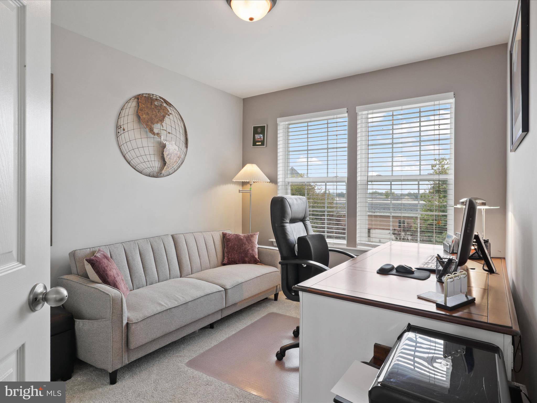 16006 Madison Ridge Place Gainesville, VA 20155 - Photo 30 of 48 a living room with furniture and a window