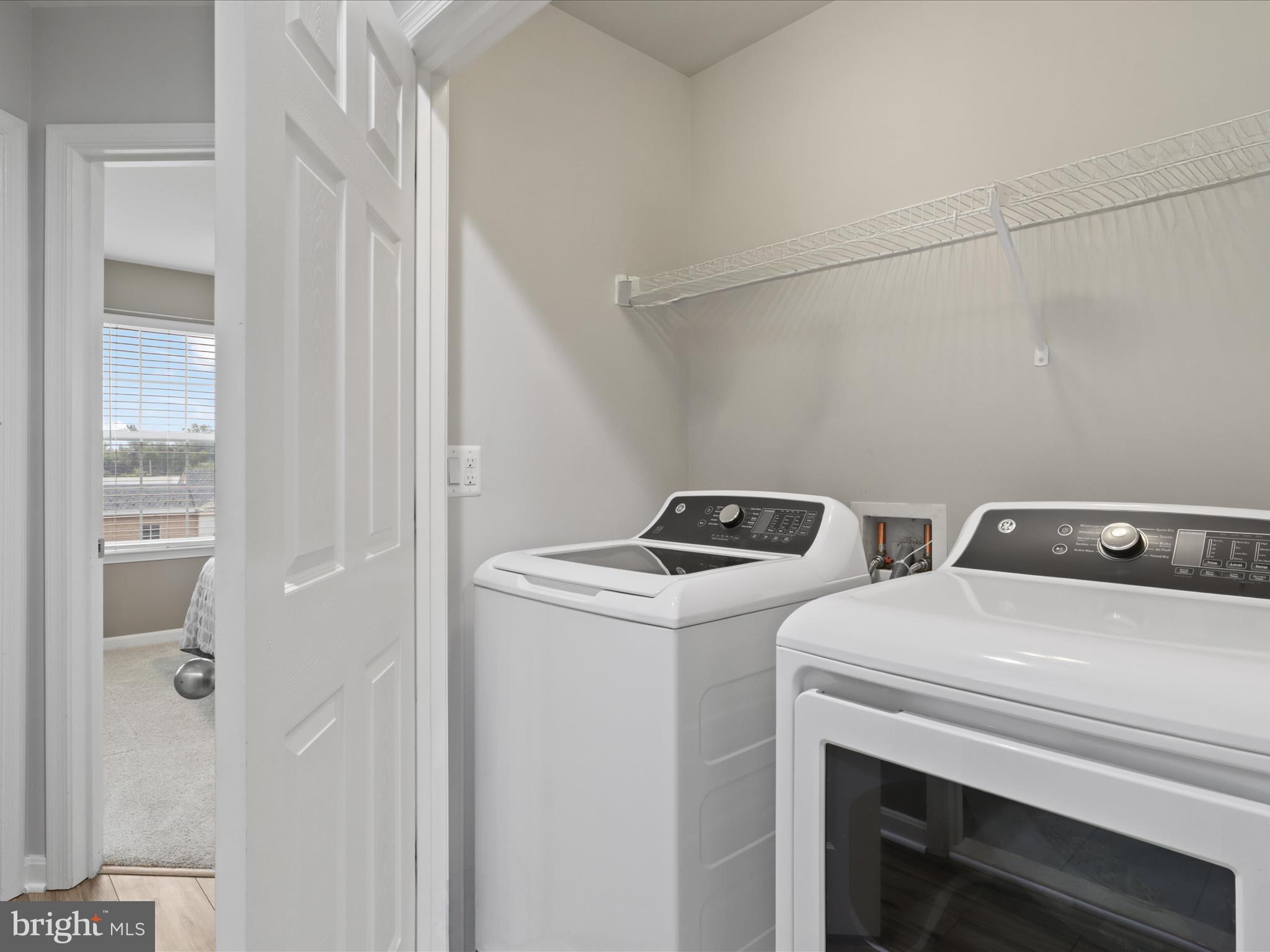 16006 Madison Ridge Place Gainesville, VA 20155 - Photo 32 of 48 a utility room with dryer and washer