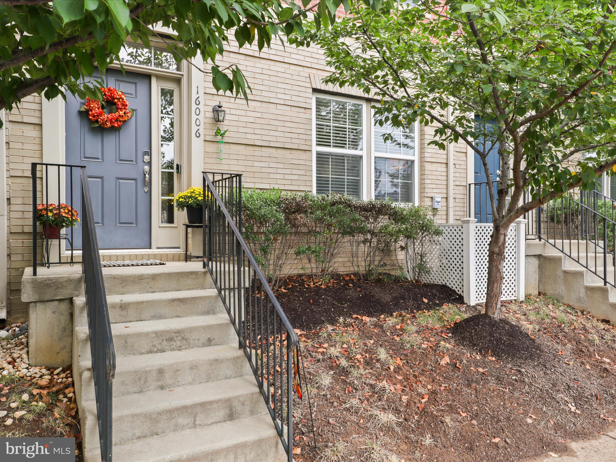 16006 Madison Ridge Place Gainesville, VA 20155 - Photo 4 of 48 a view of a house with a yard