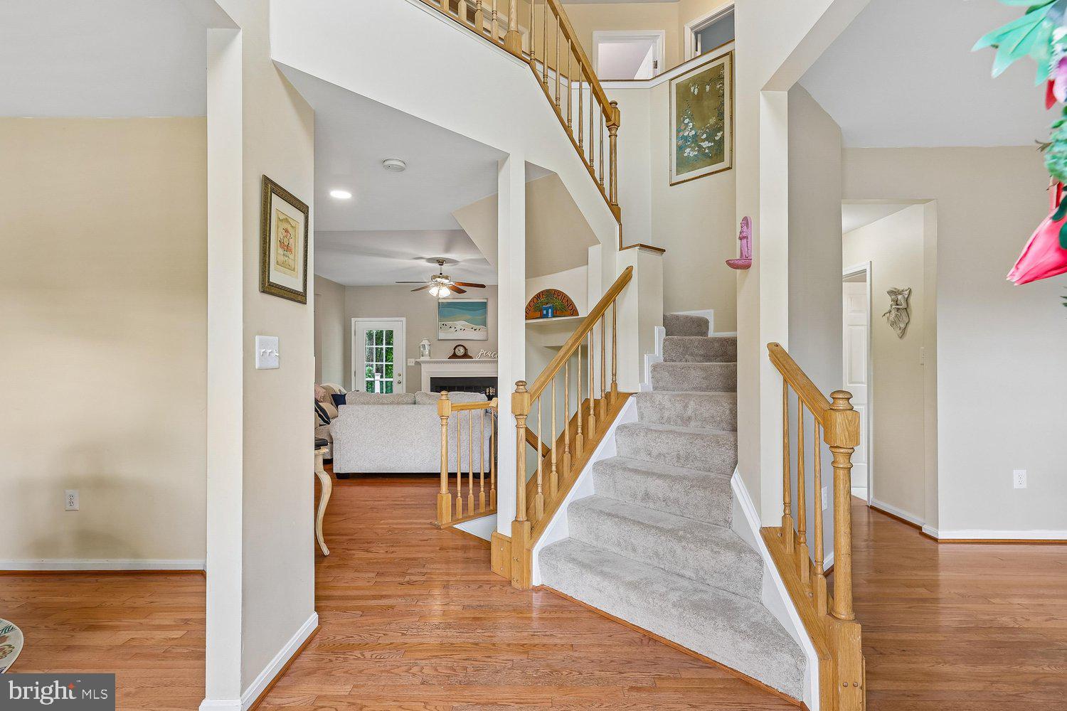 3707 Turn Back Trail Triangle, VA 22172 - Photo 4 of 55 a view of entryway and hall with wooden floor
