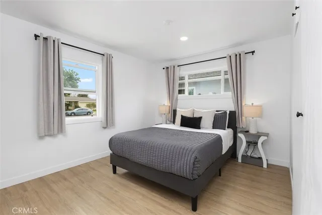 a room with a bed and a window