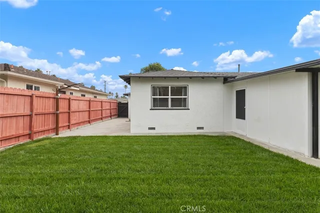 a view of a backyard with a garden
