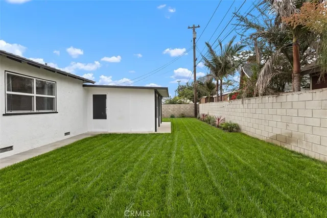 a view of a backyard with a garden