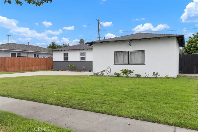 a house view with a garden space