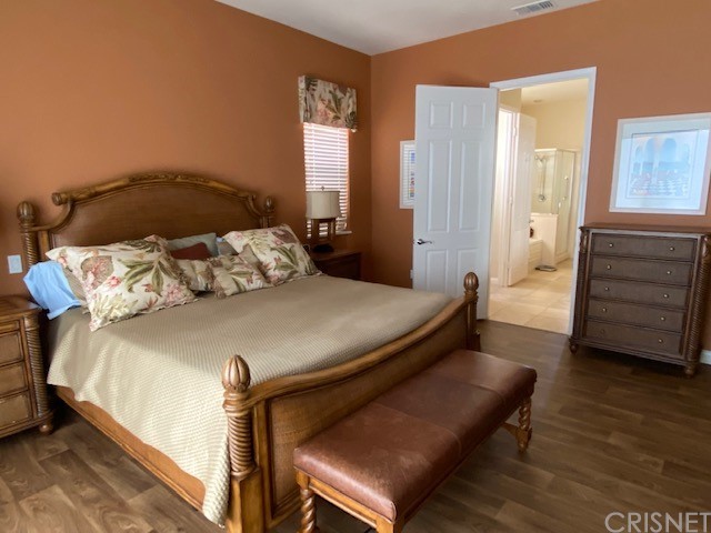 80278 Camino San Mateo Indio, CA 92203 - Photo 23 of 63 a bedroom with a bed and a window