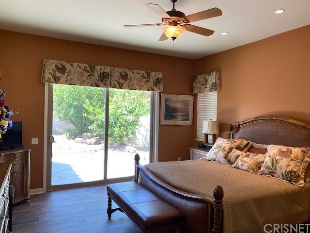 80278 Camino San Mateo Indio, CA 92203 - Photo 24 of 63 a bedroom with a bed and a large window