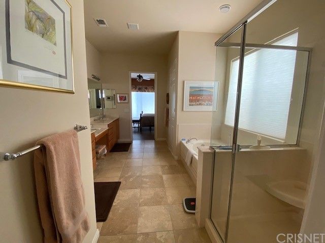 a bathroom with a shower and a toilet