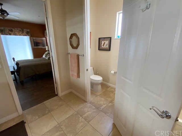 80278 Camino San Mateo Indio, CA 92203 - Photo 31 of 63 a bathroom with a toilet and a shower