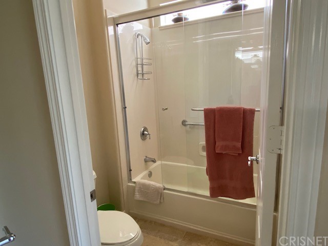 80278 Camino San Mateo Indio, CA 92203 - Photo 36 of 63 a bathroom with a shower and a toilet