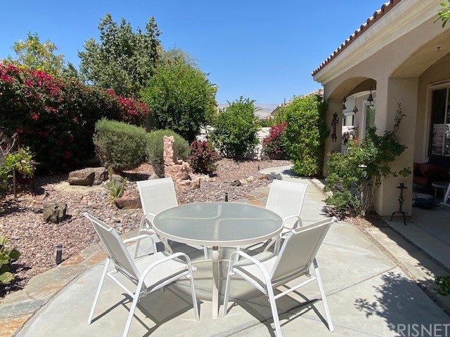 80278 Camino San Mateo Indio, CA 92203 - Photo 53 of 63 a outdoor space with a table and chairs