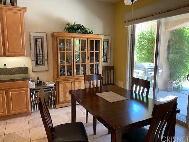 80278 Camino San Mateo Indio, CA 92203 - Photo 9 of 63 a view of a dining room with furniture window and outside view
