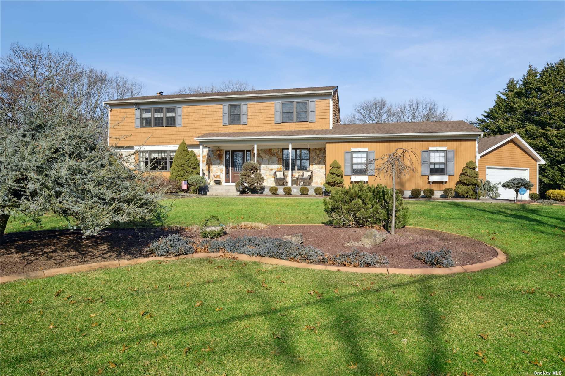 519 Miller Place Road Miller Place, NY 11764 - Photo 1 of 1 a view of a house with backyard and sitting area